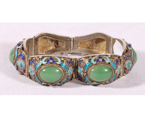Chinese silver bracelet of six flexible panels, the enamel decorated wirework domed panels set with four cabochan jade ovals,
