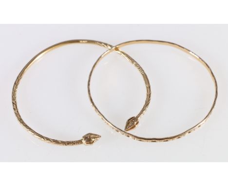 9ct gold bangle, 6.4g, and a slave bangle stamped OT14K, 15.5g.