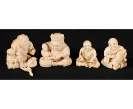A group of four small netsuke all figural, and varying in size from 3.5cm to 3cm, Meiji/Taisho