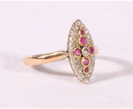 Unhallmarked yellow gold ruby and diamond ring with navette shaped setting, size N, 2.3g.