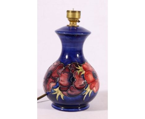 Moorcroft baluster table lamp decorated with anemone pattern, 21cm tall.