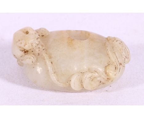 Chinese 19th Century jade brush washer of a pale grey green colour, the bowl with relief carving of a bat and Chi Lung, with 