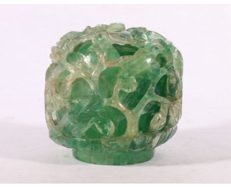 Chinese carved hardstone domed lamp, the exterior with relief decoration of birds amongst scrolling foliage, 12cm.