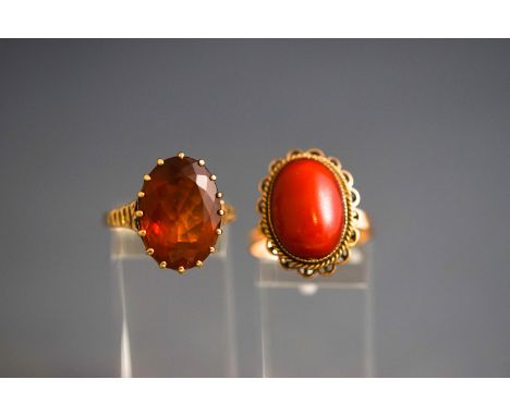 Two gem set rings, comprising a 9ct gold and oval citrine single stone ring, Birmingham 1972, size R, 5 grams gross; and an o