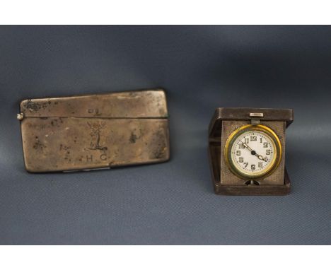 An Art Deco silver cased purse watch and a silver calling card case; the rectangular engine turned purse watch enclosing a Sw