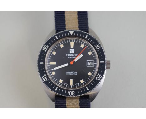 Tissot, Navigator Automatic, a vintage stainless steel tonneau-shaped wrist watch, the round black dial with cream-luminous b