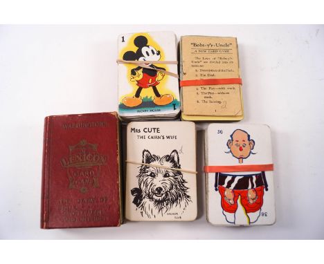 A selection of games including card sets, Questions by Gibsons, Gullivers Travel 1939, Anchor Club Dog Happy Family 1930's, L