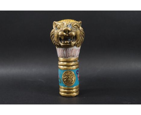 A Chinese cloisonne walking stick handle in the form of a tiger's head, 11.5cm high