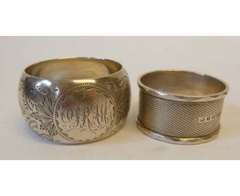 VICTORIAN SILVER CIRCULAR NAPKIN RING with engine turned decoration, Birmingham 1893, and a VICTORIAN SILVER NAPKIN RING, cir
