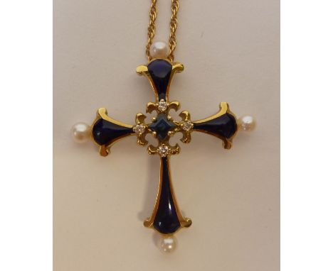 HOUSE OF IGOR CARL FABERGE, "THE SAPPHIRE MIDNIGHT CROSS", 18CT GOLD AND BLUE ENAMEL CROSS PENDANT, set with single square cu