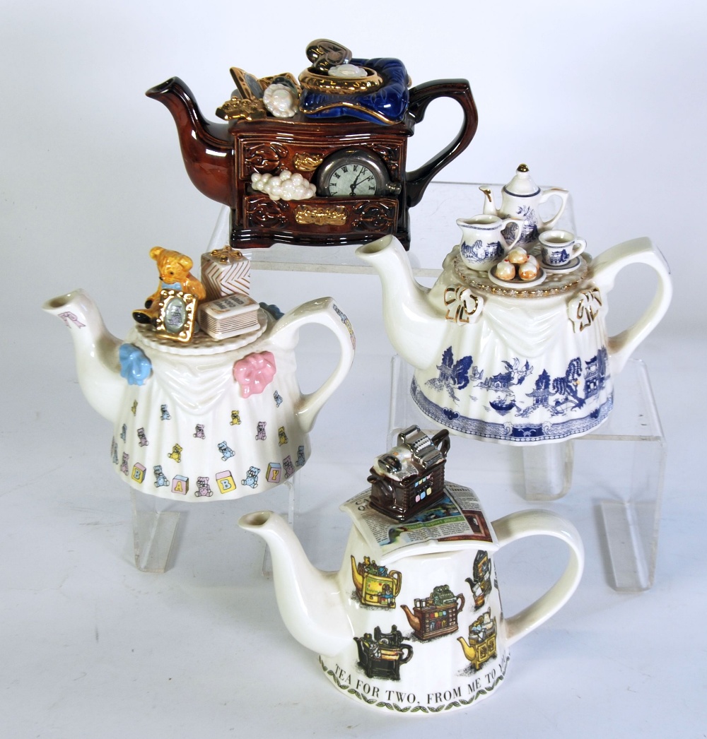 FOUR PAUL CARDEW TWO CUP NOVELTY POTTERY TEAPOTS, including a Special