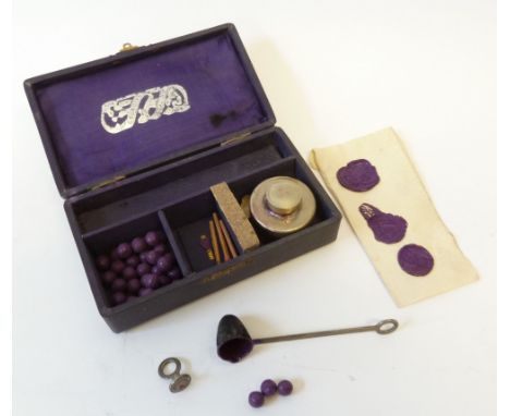 NINETEENTH CENTURY SEALING WAX SET, with purple wax pellets, lighter, ladle and seal, in silk lined case "The New Georgian Se
