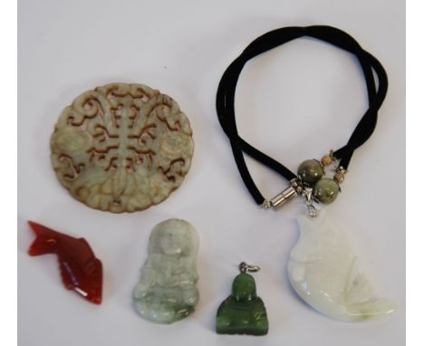 CARVED JADE BUDDAH PENDANT, A CARVED AND PIERCED HARDSTONE DISK AND THREE OTHER HARDSTONE PENDANTS