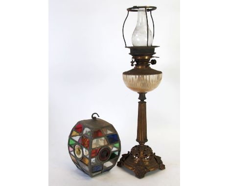 VICTORIAN GILT METAL TABLE OIL LAMP,  with prism cut glass reservoir on fluted and tapered gilt metal column and pierced circ