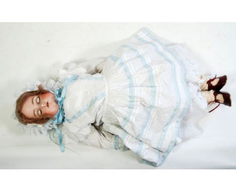 SIMON AND HALBIG (K & R) LARGE BISQUE SWIVEL HEADED DOLL, with sleeping flirty eyes, open mouth showing four top teeth and wi