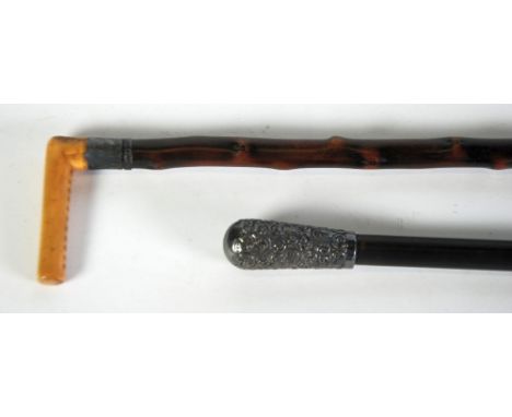 VICTORIAN EBONISED SWAGGER STICK with embossed silver pommel and top, Birmingham hallmark, 28 1/2" (72.4cm) long, TOGETHER WI