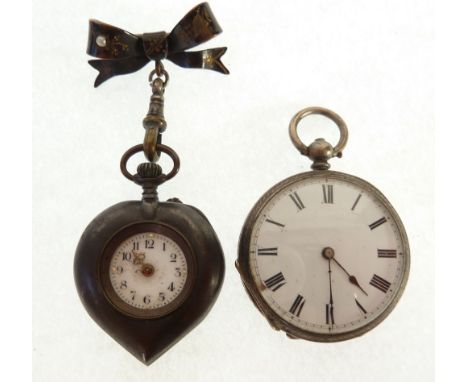 GUN METAL CASED HEART SHAPED FOB WATCH, mechanical movement, arabic dial, ON SEED PEARL SET BOW BROOCH, in case, AND A SILVER