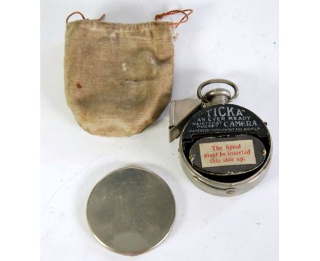 HOUGHTON'S 'TICKA' NOVELTY WAISTCOAT POCKET WATCH PATTERN ROLL FILM CAMERA, the nickel case monogrammed, in soft fabric, draw