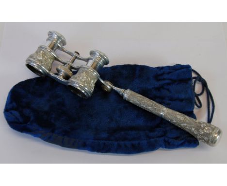 PAIR OF PROBABLY FRENCH EMBOSSED  BRIGHT METAL OR LIGHT ALLOY OPERA GLASSES, with floral embossed and bright cut decoration, 