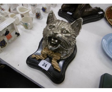 A bronze silvered cats head inkwell