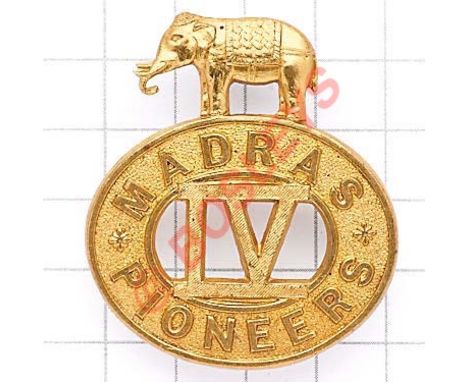 Indian Army. 4th Madras Pioneers cap badge circa 1901-2. Scarce die-stamped brass elephant on oval “Madras Pioneers”, IV to v
