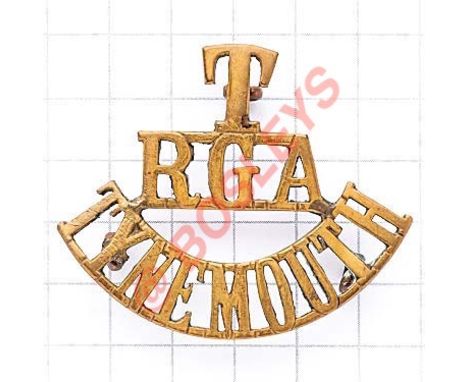 T / RGA / TYNEMOUTH brass Royal Garrison Artillery shoulder title circa 1908-20. Loops Defended Port Battery HQ North Shields