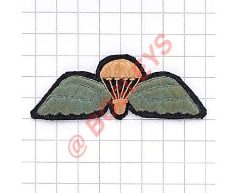 44th Indian Airborne Division WW2 parachute wing. Padded white parachute flanked by light blue wings with central fleck heavi