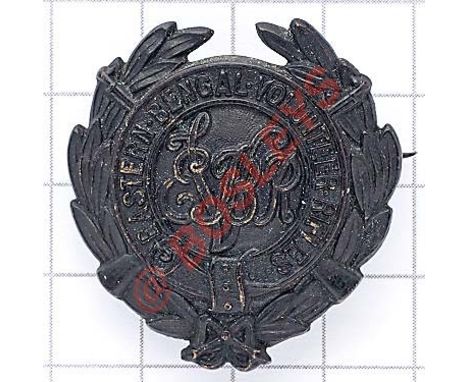 Indian Army. Eastern Bengal Volunteer Rifles pagri badge. British made die-stamped blackened laurel wreath bearing crossed ri