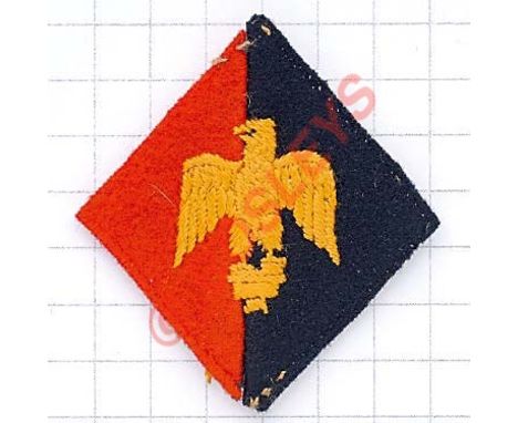 646 Light Anti-Aircraft Regt. Royal Artillery cloth formation sign. Golden eagle finial from French standard embroidered on r