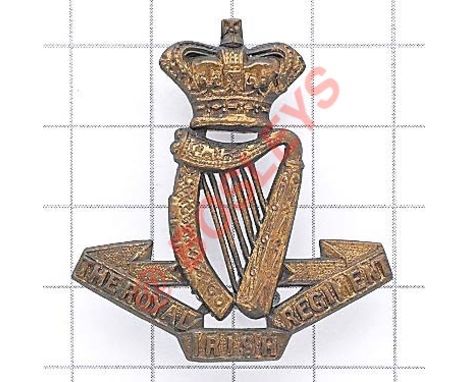 Royal Irish Regiment Victorian OR’s brass cap badge circa 1896-1901. Die-stamped crowned Harp on title scroll. (KK 613) Loops
