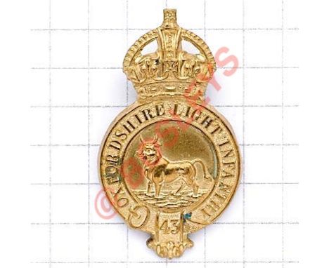 Oxfordshire Light Infantry Depot Staff rare cap badge circa 1902-08. Die-stamped brass crowned strap inscribed “Oxfordshire L