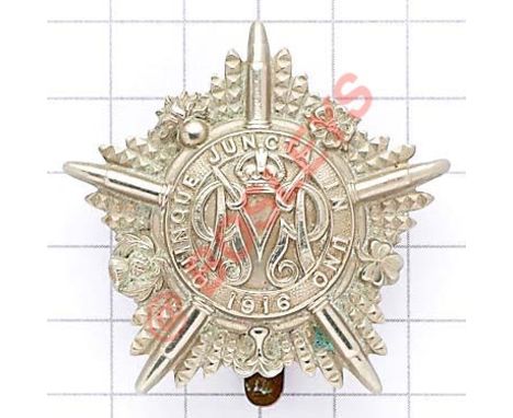 Machine Gun Guards white metal OR’s cap badge circa 1917-18. Die-stamped. (KK 923) Slider Redesigned 8th May 1918 as Guards M