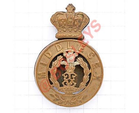 DCO Middlesex Regiment OR’s glengarry badge. Post 1885 helmet plate centre (KK 345) with separate crown (KK 288) above, mount