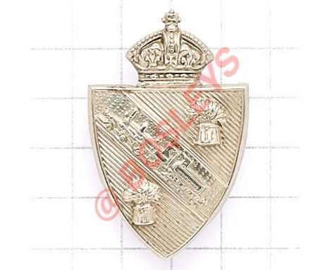 Indian. Bengal & North Western Railway Volunteer Rifles cap badge. British made die-stamped white metal crowned shield diagon