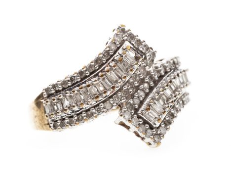 DIAMOND CROSSOVER RING, each central section set with baguette cut stones bordered by round brilliant cut stones, the diamond