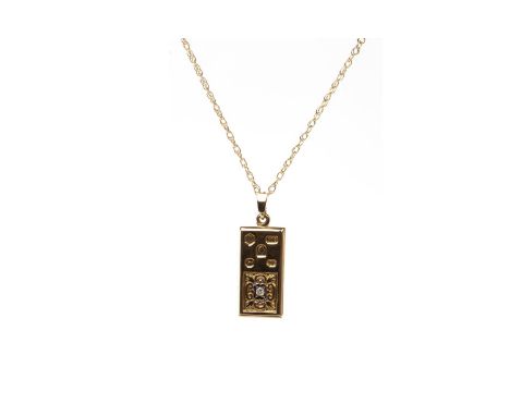 NINE CARAT GOLD INGOT PENDANT, with hallmarks to the front and set with a single diamond, on a chain marked 375, 10.1g gross