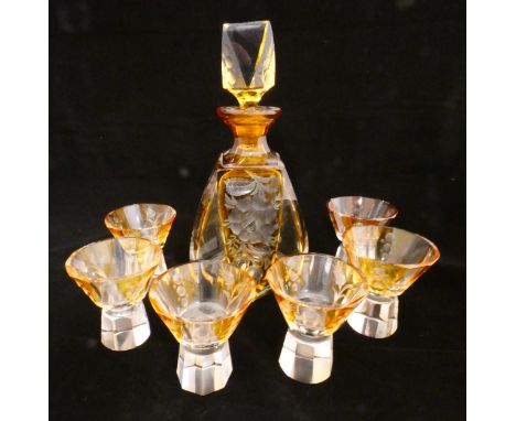 Art Deco Bohemian glass seven-piece liqueur set comprising an amber tinted decanter and stopper, with six glasses, decorated 