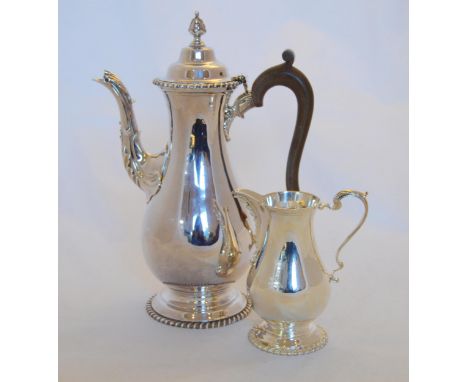 Garrard &amp; Co Ltd,&nbsp;Regent Street, London c. 1977, silver coffee pot in the Georgian design, bearing Britannia and Que