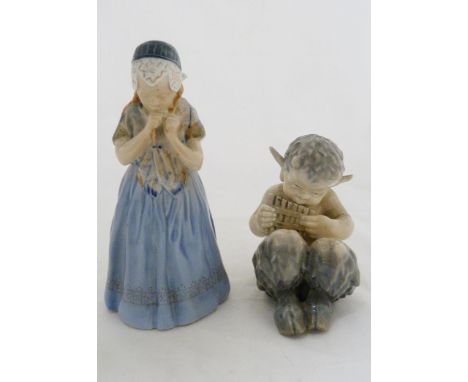Christian Thomsen (Danish) for Royal Copenhagen Figure of a faun playing the pan pipes, no. 1736, 13cm high, and another Roya