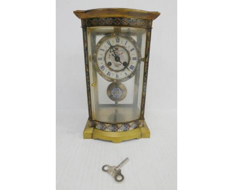 French brass and champlevé enamel four glass clock, c. late 19th century, with porcelain twin train dial, striking on a gong,