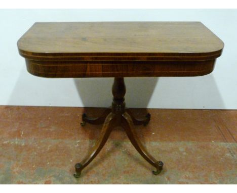 Victorian boxwood strung rosewood card table, the top section revealing a later red felt-lined surface, on quadripartite supp