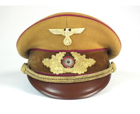 A German Third Reich NSDAP Political Leader’s Gauleitung level visor cap (circa 1939-45) constructed of standard brown thick 