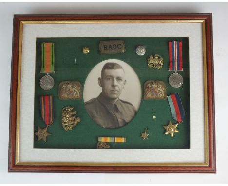 A framed set of four Second World War medals awarded to a soldier of the Royal Army Ordnance Corps, comprising War Medal, Def