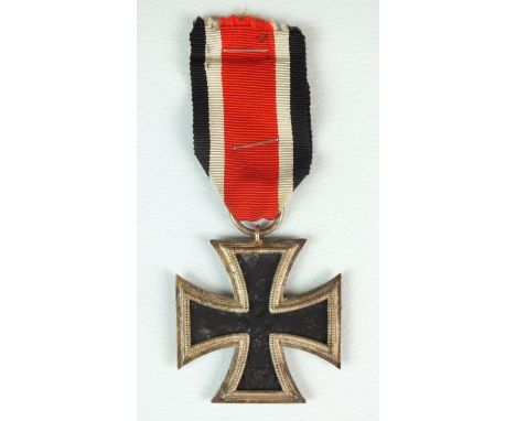 A German Third Reich 1939 Iron Cross, 2nd class by Klein und Quenzer A.G., Idar/Oberstein, constructed with a magnetic centra
