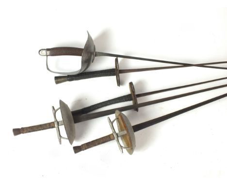 A group of five fencing foils 19th and early 20th centuries comprising a pair, with Solingen blades and French Brevete SGDG p