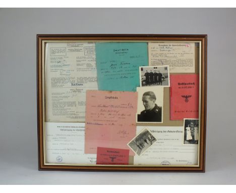 A selection of photographs and paperwork relating to Stabsgefreiter Paul Alois Fischer (Panzer Division), including a certifi