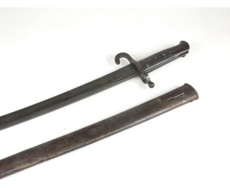 An Austrian Model 1867 Werndl rifle bayonet (unshortened) with a yataghan blade, black pressed leather grips, steel crossguar