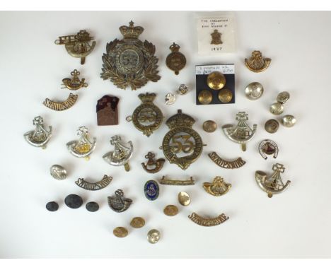A collection of military badges and buttons of the 53rd (Shropshire) Regiment of Foot; Shropshire Yeomanry and KSLI together 