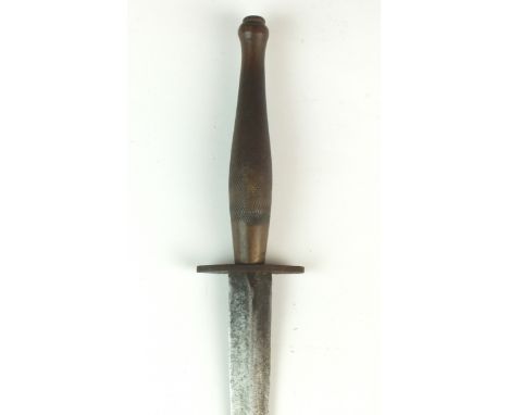 A British Second World War Fairbairn Sykes Second pattern fighting knife with a flattened, diamond section blade, with an unm