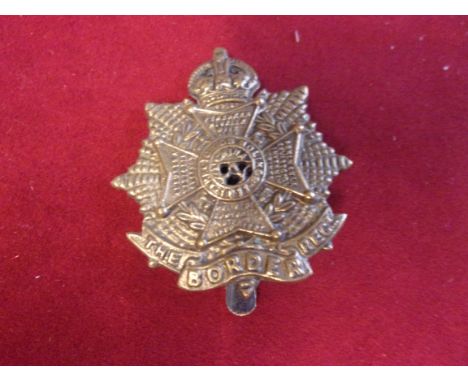 The Border Regiment WWI Economy Forage Cap Badge (Brass), two lugs, this variant is slightly larger. K&amp;K: 645